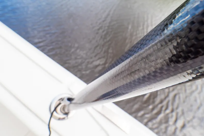 Slide: The Image of Close-up of a carbon fiber pole on a 2023 Intrepid 345 Valor boat. - 136