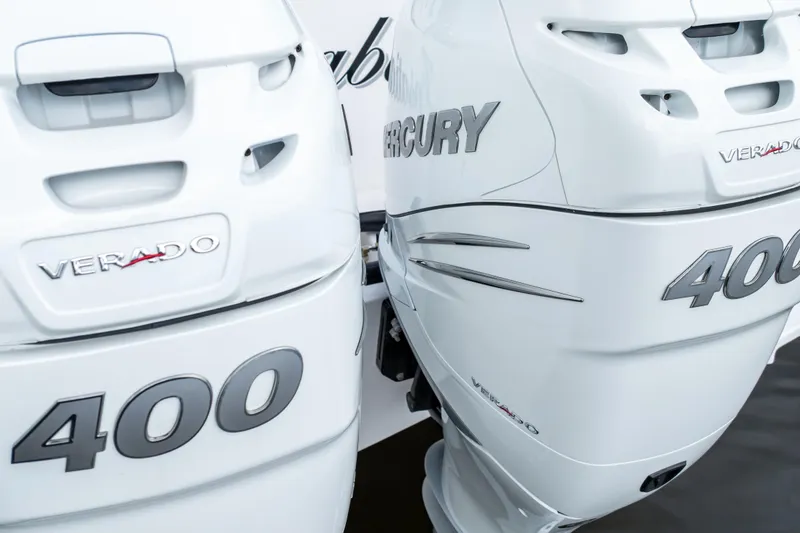 Slide: The Image of Twin Mercury Verado 400 engines on a 2023 Intrepid 345 Valor boat. - 21