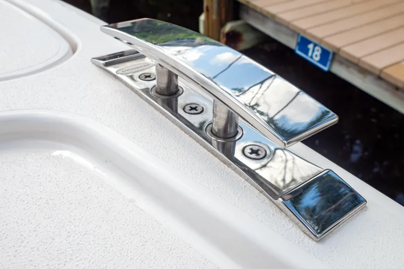 Slide: The Image of Chrome cleat on 2023 Intrepid 345 Valor boat deck, docked near slip 18. - 31