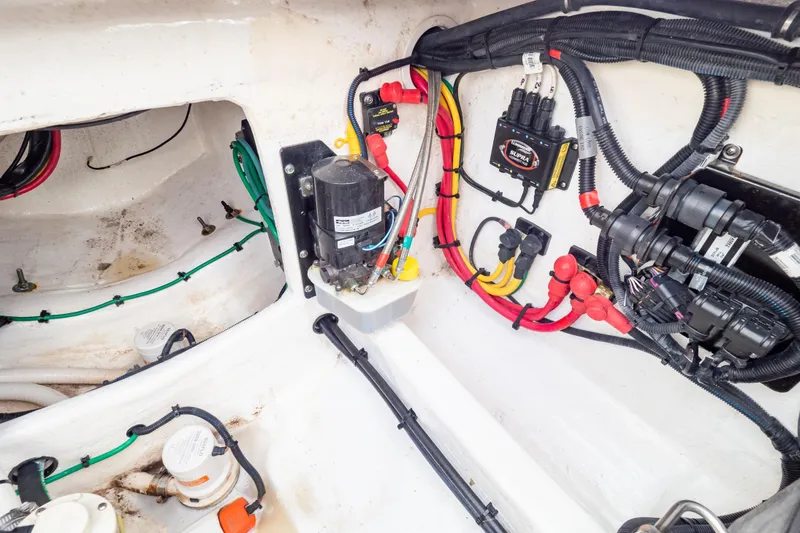 Slide: The Image of Electrical wiring and components inside a 2023 Intrepid 345 Valor boat. - 39