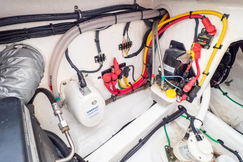 Slide: The Image of Electrical wiring and components inside a 2023 Intrepid 345 Valor boat. - 40