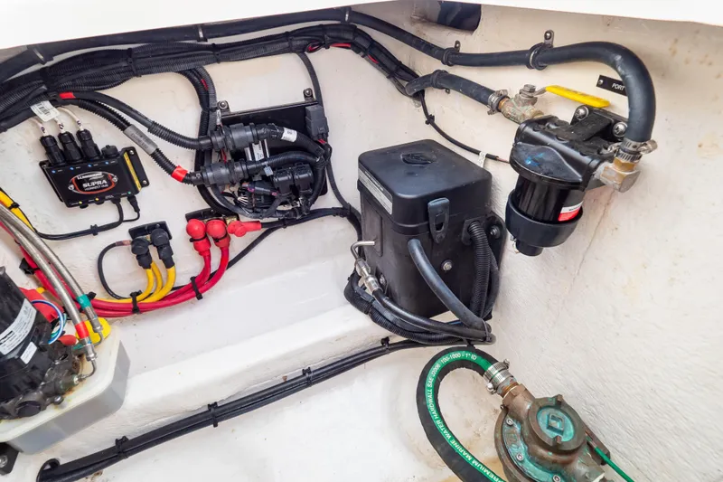 Slide: The Image of Engine compartment of 2023 Intrepid 345 Valor, showcasing wiring and mechanical components. - 41