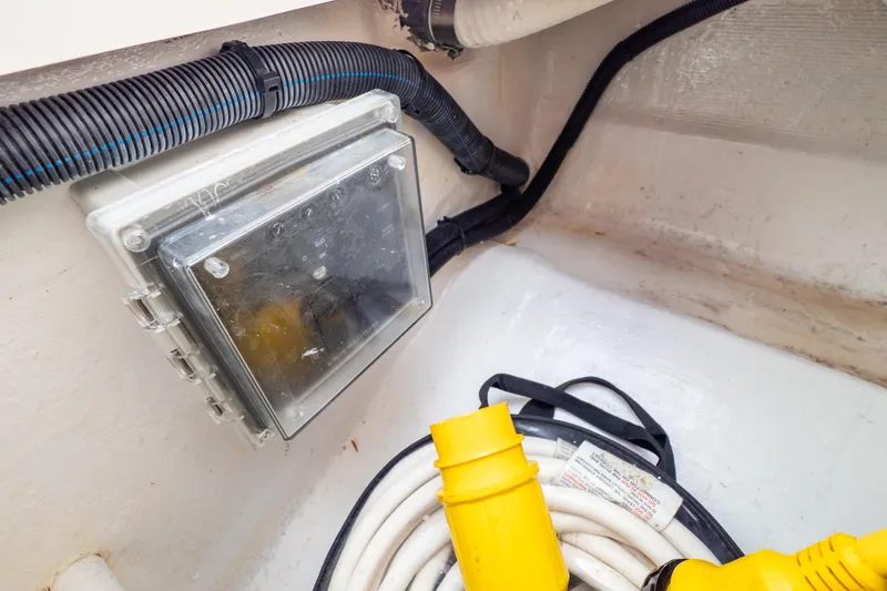 Slide: The Image of 2023 Intrepid 345 Valor boat wiring and electrical components with yellow cable. - 43