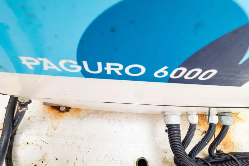 Slide: The Image of Paguro 6000 generator on 2023 Intrepid 345 Valor boat, with visible wiring connections. - 46