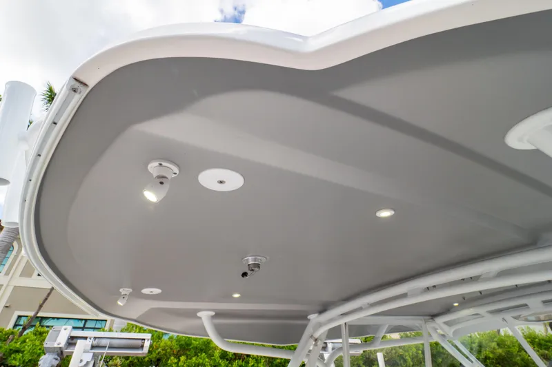 Slide: The Image of 2023 Intrepid 345 Valor boat canopy with integrated lighting and sleek design. - 53