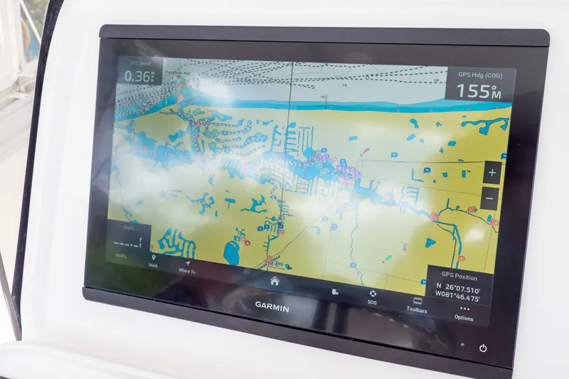 Slide: The Image of Garmin navigation display on 2023 Intrepid 345 Valor boat, showing detailed marine map. - 72