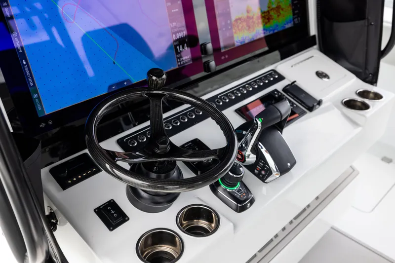 Slide: The Image of Control panel of 2025 Freeman 42 LR boat with advanced navigation and steering systems. - 44