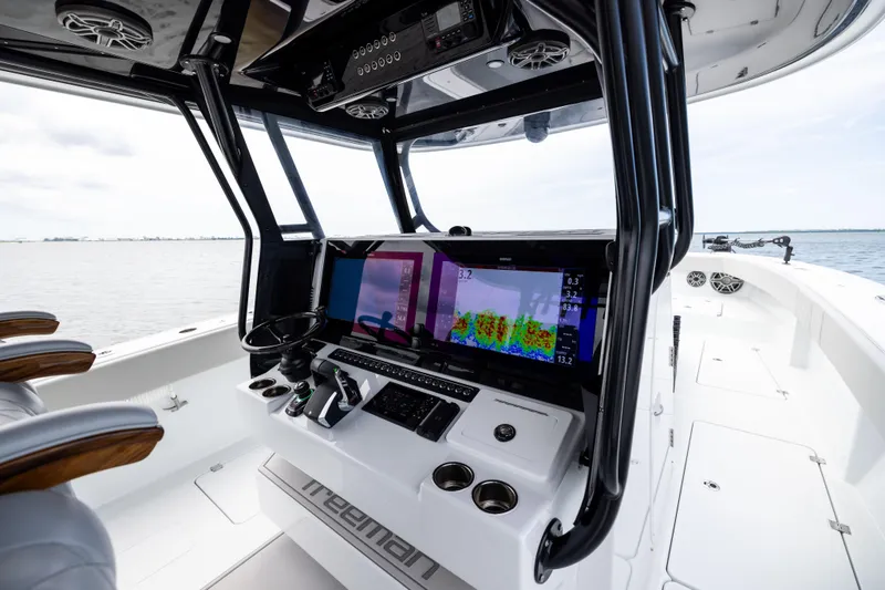 Slide: The Image of Interior view of 2025 Freeman 42 LR boat with advanced navigation system. - 49