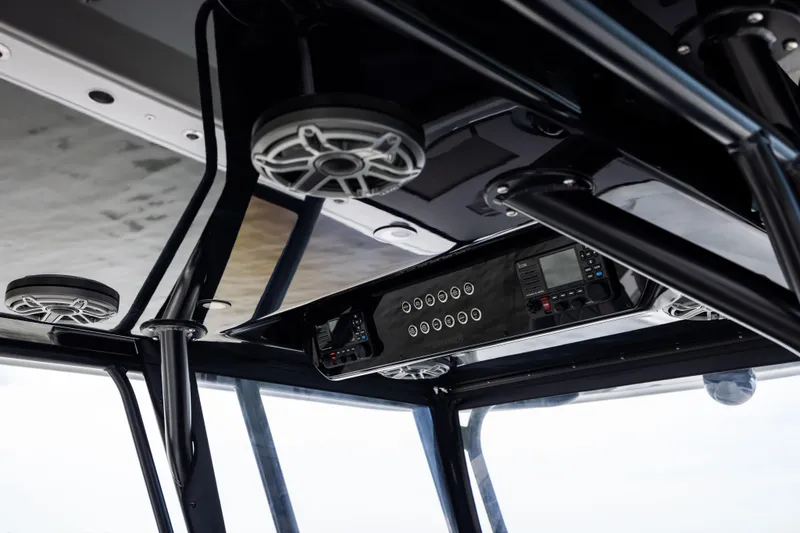 Slide: The Image of Interior view of 2025 Freeman 42 LR boat with advanced control panel and speakers. - 50