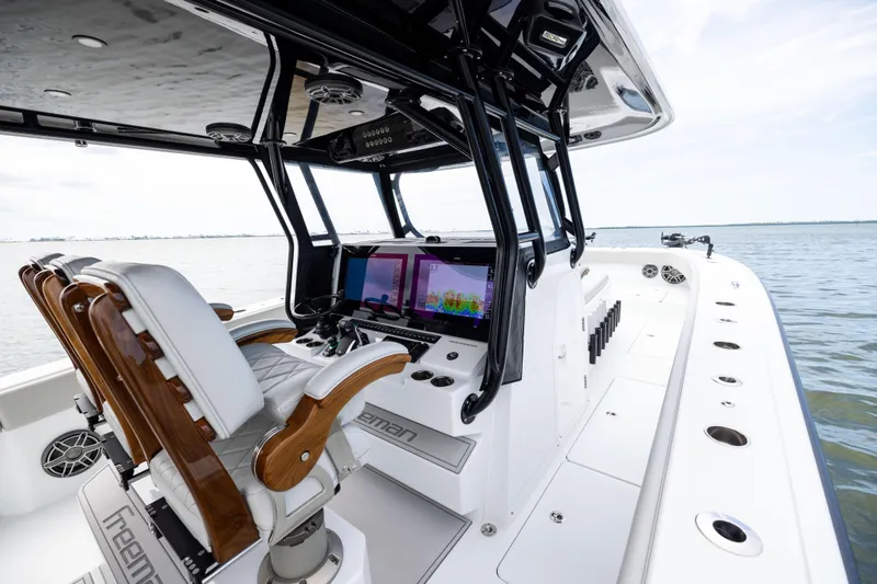 Slide: The Image of Interior view of 2025 Freeman 42 LR boat with advanced navigation system. - 52