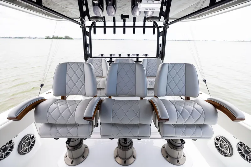 Slide: The Image of Luxurious seating on the 2025 Freeman 42 LR boat, featuring elegant quilted upholstery. - 58
