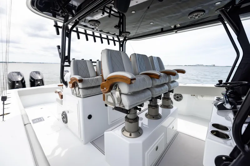 Slide: The Image of Luxury seating on 2025 Freeman 42 LR boat with ocean view. - 61