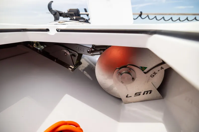 Slide: The Image of Freeman 42 LR 2025 boat anchor compartment with visible equipment and orange rope. - 73