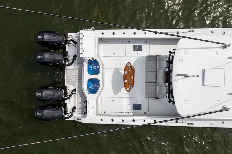 Slide: The Image of Overhead view of 2025 Freeman 42 LR boat with four engines and spacious deck. - 8