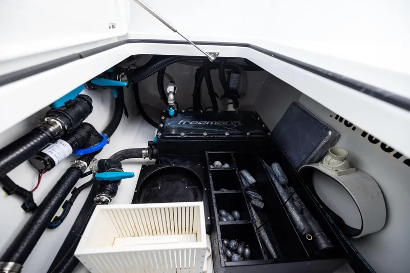 Slide: The Image of Interior view of 2025 Freeman 42 LR boat showing storage and mechanical components. - 86