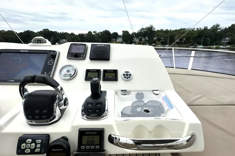 Slide: The Image of Control panel of a 2014 Prestige 450 yacht with navigation equipment. - 29