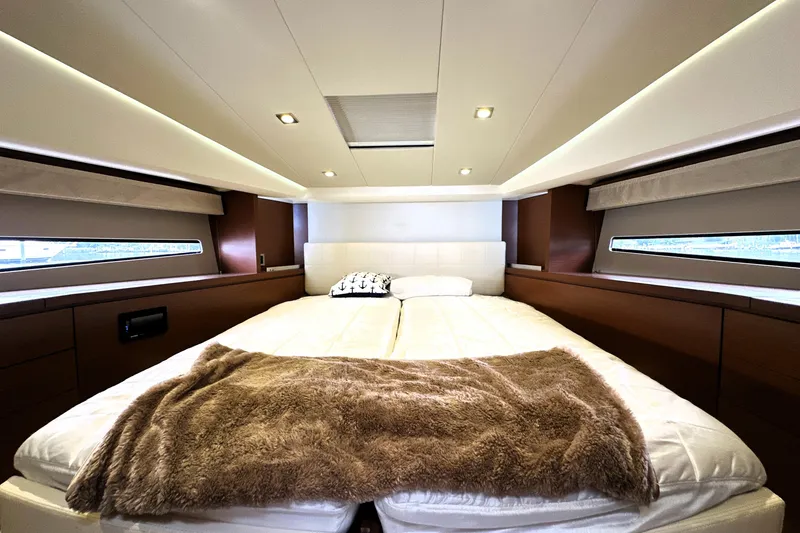 Slide: The Image of Luxurious bedroom interior of 2014 Prestige 450 yacht with plush bedding and modern design. - 3