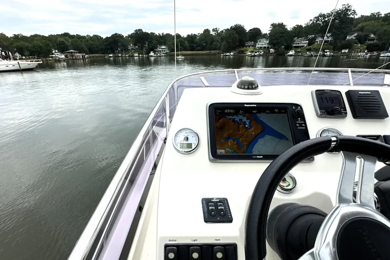 Slide: The Image of Cockpit view of 2014 Prestige 450 yacht with navigation system on calm waters. - 30