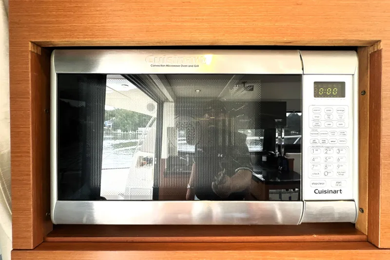 Slide: The Image of Cuisinart convection microwave oven in a 2014 Prestige 450 yacht kitchen. - 35