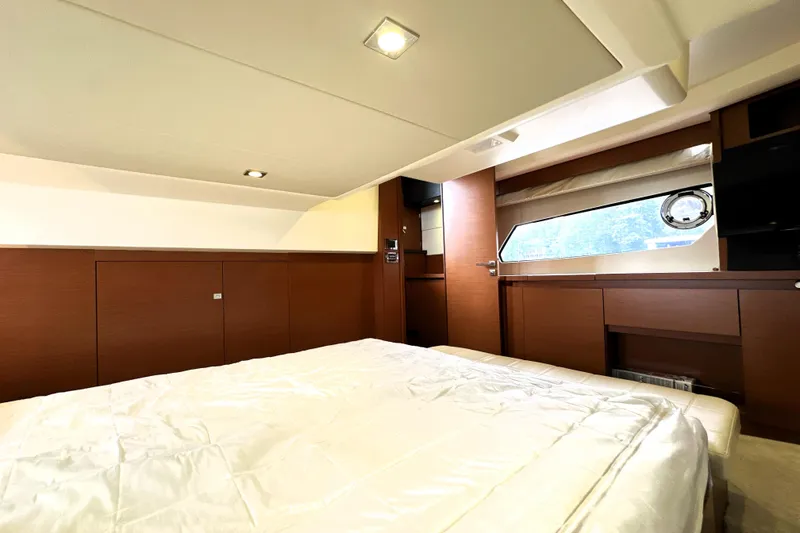 Slide: The Image of Luxurious cabin interior of 2014 Prestige 450 yacht with modern wood finish. - 64