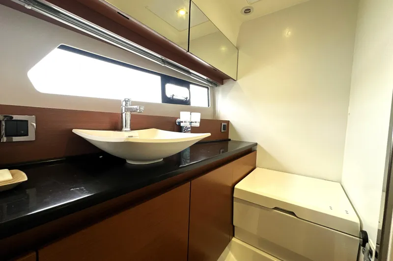 Slide: The Image of Luxurious bathroom interior of 2014 Prestige 450 yacht with modern sink and sleek design. - 66