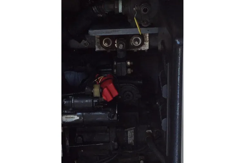 Slide: The Image of Engine compartment of a 2003 Sea Ray 320 Sundancer boat. - 3