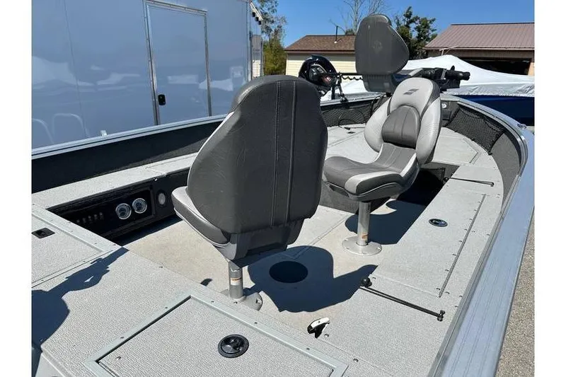 Slide: The Image of 2021 Starcraft Delta 168 Tiller boat interior with Yamaha F70LA, featuring two seats and control panel. - 26
