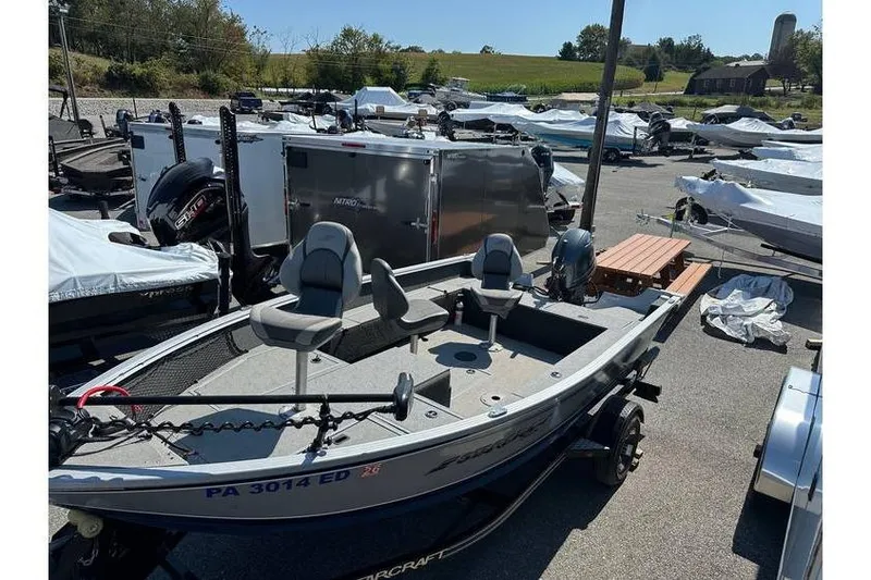 Slide: The Image of 2021 Starcraft Delta 168 Tiller boat with Yamaha F70LA, parked on trailer. - 5