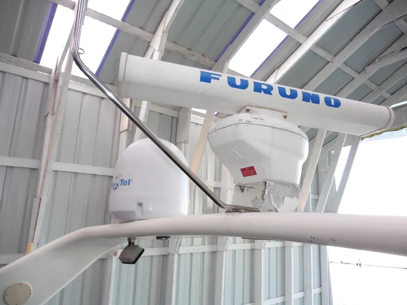 Slide: The Image of Radar and satellite equipment on a 1997 Sea Ray 440 Express Bridge yacht. - 38