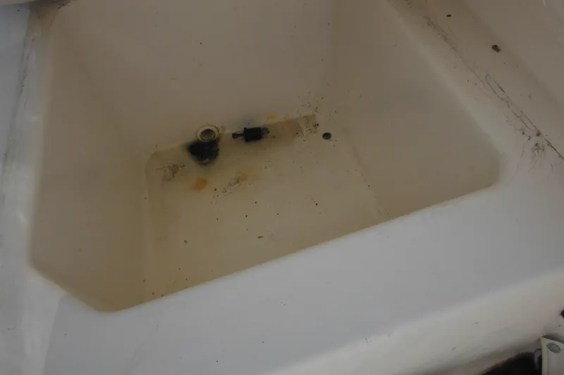 Slide: The Image of Dirty compartment in 1998 Boston Whaler 20 Ventura Bowrider boat. - 20