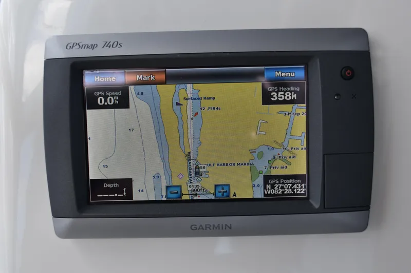 Slide: The Image of Garmin GPSmap 740s display on 2010 Boston Whaler 230 Dauntless, showing navigation map and data. - 14
