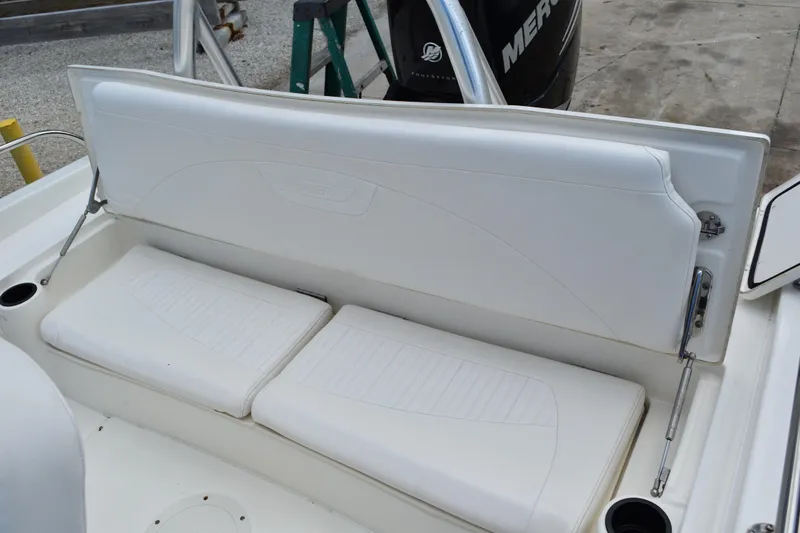Slide: The Image of White seating area on a 2010 Boston Whaler 230 Dauntless boat. - 36