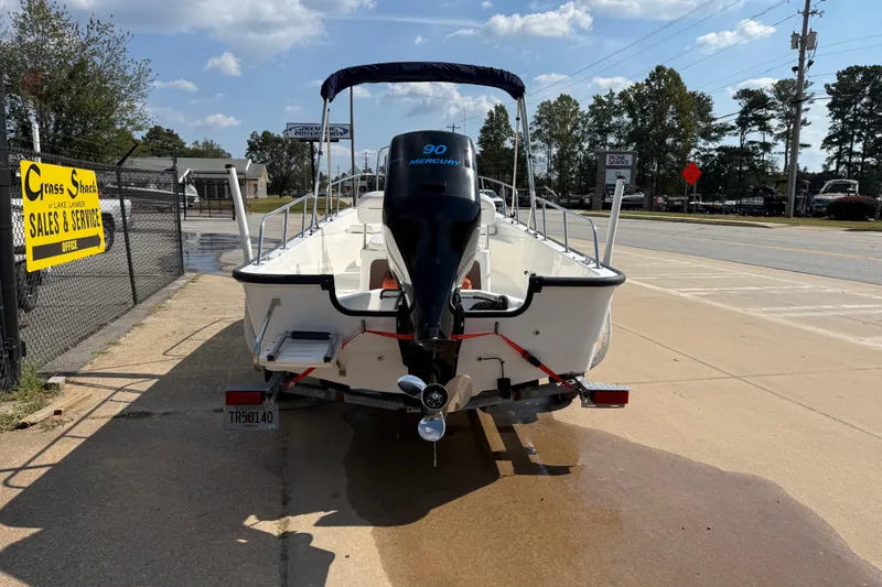 Slide: The Image of 2005 Boston Whaler 170 Montauk boat with Mercury engine at sales lot. - 5