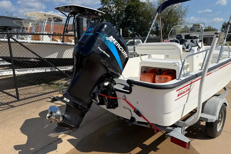 Slide: The Image of 2005 Boston Whaler 170 Montauk boat with Mercury FourStroke engine on trailer. - 6