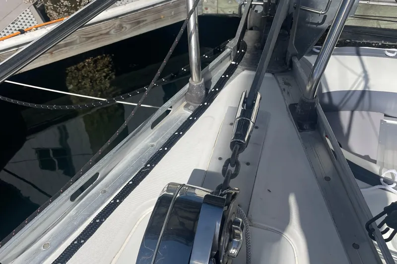 Slide: The Image of Deck view of a 1985 Beneteau First 345 sailboat, showcasing rigging and hardware. - 7