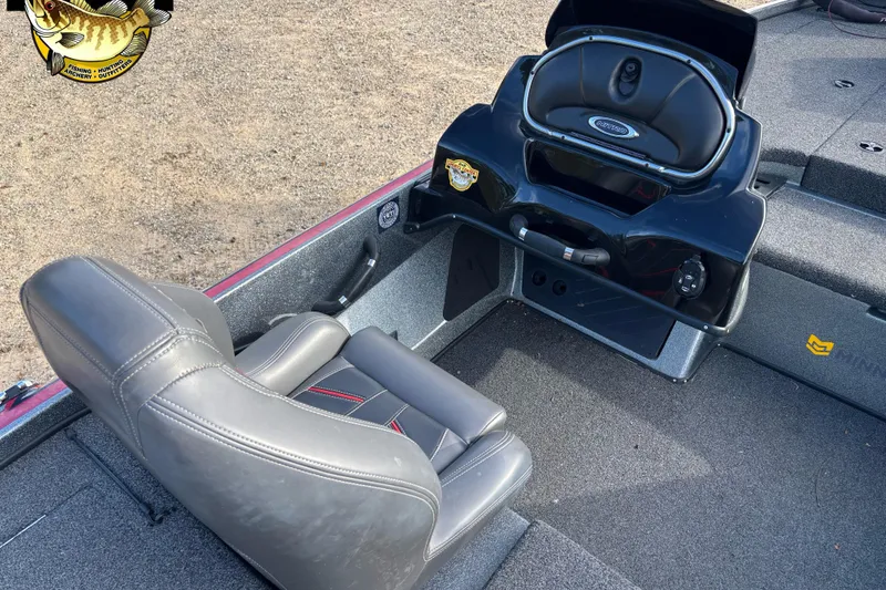 Slide: The Image of 2017 Nitro Z18 boat interior with gray seating and control panel. - 6