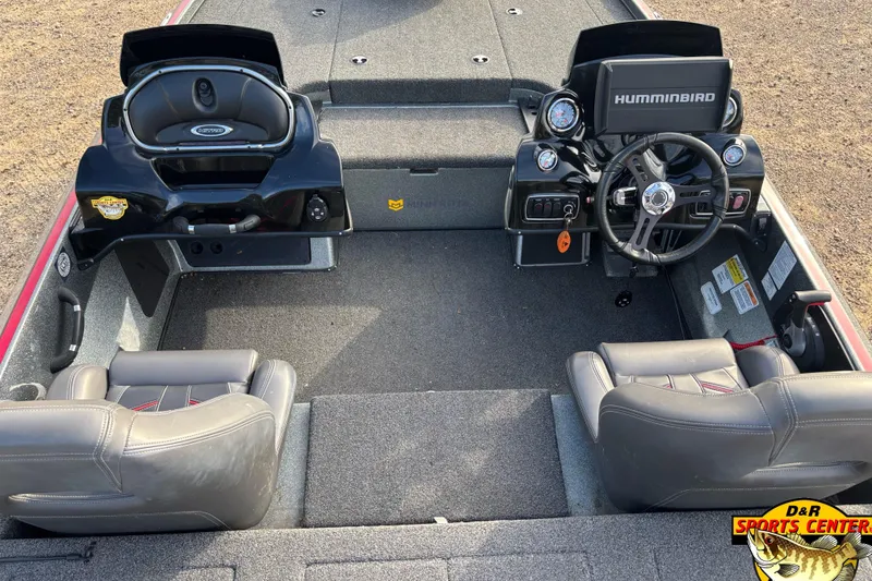 Slide: The Image of Interior of a 2017 Nitro Z18 boat with steering wheel and seating. - 9