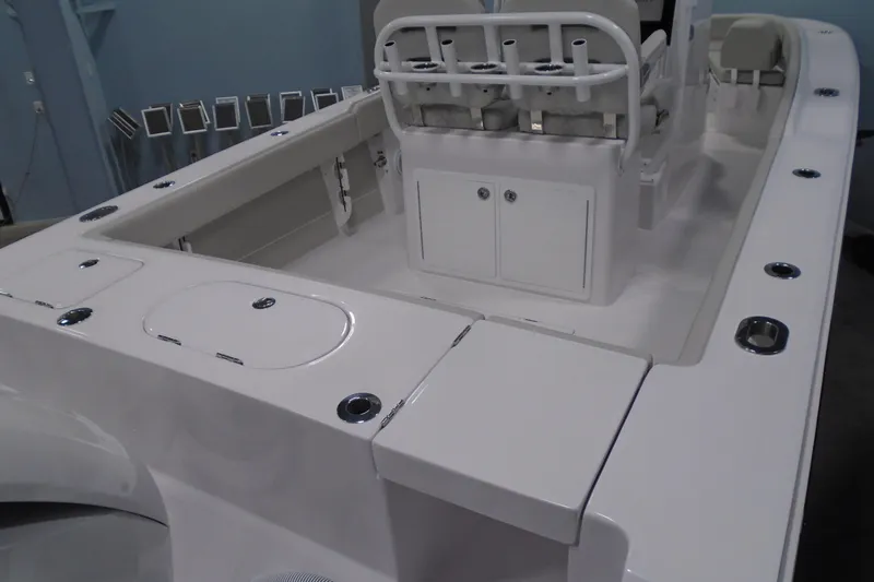 Slide: The Image of 2026 Jupiter 26 boat interior with seating and storage compartments. - 10