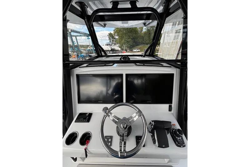 Slide: The Image of Aerial view of 2026 Yellowfin 39 Offshore boat speeding on water. - 10