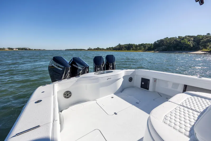 Slide: The Image of 2026 Yellowfin 39 Offshore boat with triple Mercury engines on open water. - 26