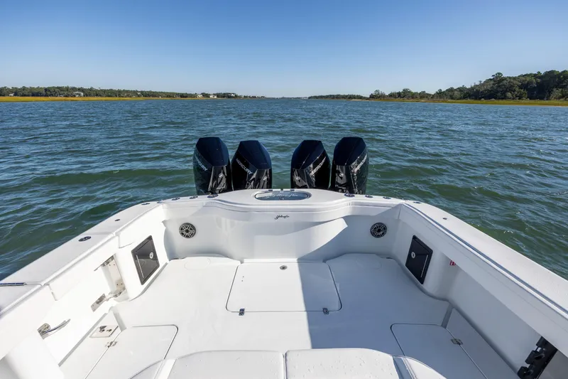 Slide: The Image of 2026 Yellowfin 39 Offshore boat with triple outboard engines on open water. - 27