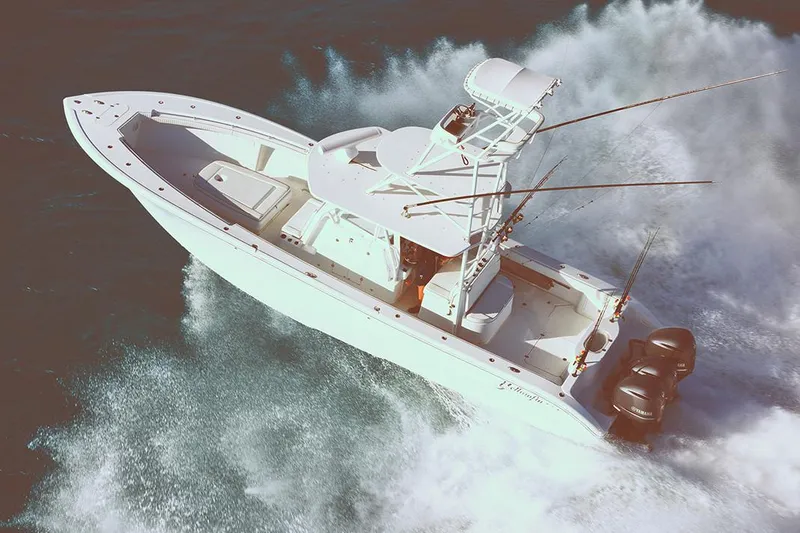 Slide: The Image of 2026 Yellowfin 39 Offshore boat cruising on a calm waterway. - 3
