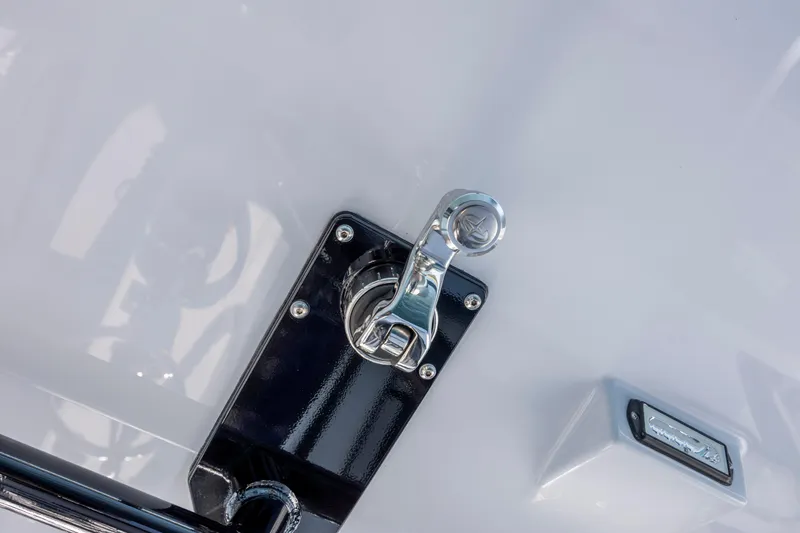 Slide: The Image of Close-up of a 2026 Yellowfin 39 Offshore boat latch and logo. - 36