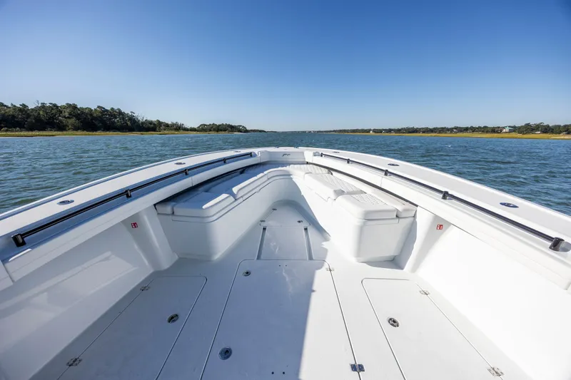 Slide: The Image of 2026 Yellowfin 39 Offshore boat on open water, clear sky, spacious deck. - 38