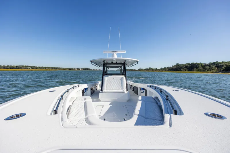 Slide: The Image of 2026 Yellowfin 39 Offshore boat on open water under clear blue sky. - 39
