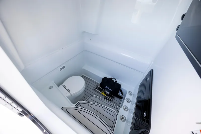 Slide: The Image of Interior of 2026 Yellowfin 39 Offshore boat featuring a compact bathroom. - 44