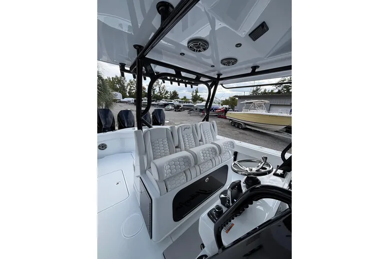 Slide: The Image of 2026 Yellowfin 39 Offshore boat cruising on open water. - 9