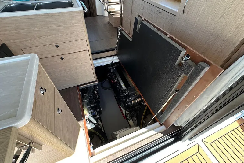 Slide: The Image of Engine compartment of 2024 Beneteau Swift Trawler 41 Sedan, showcasing interior design and machinery. - 73