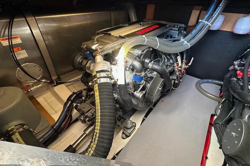 Slide: The Image of Engine room of 2024 Beneteau Swift Trawler 41 Sedan with visible machinery and components. - 76