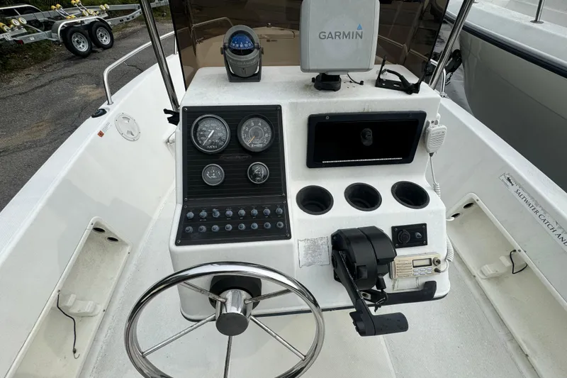 Slide: The Image of 2000 Hydra-Sports 180 Seahorse CC boat dashboard with Garmin GPS and control panel. - 5